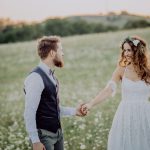 beautiful-bride-and-groom-at-sunset-in-green-natur-PZ6Q2F6.jpg